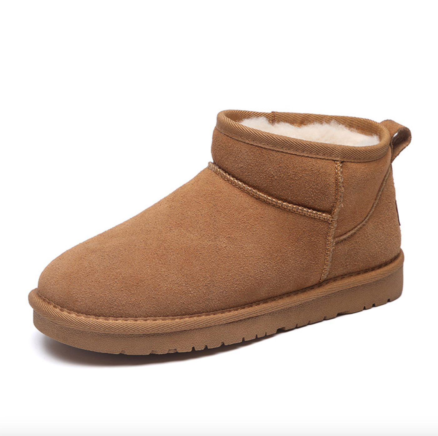 Brown suede ankle boots with a soft, fuzzy lining and a rubber sole.